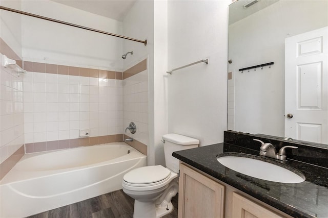 6611 Time Square Ave Unit 103, Orlando, FL 32835 - full bathroom with wood finished floors, toilet, shower / tub combination, and vanity
