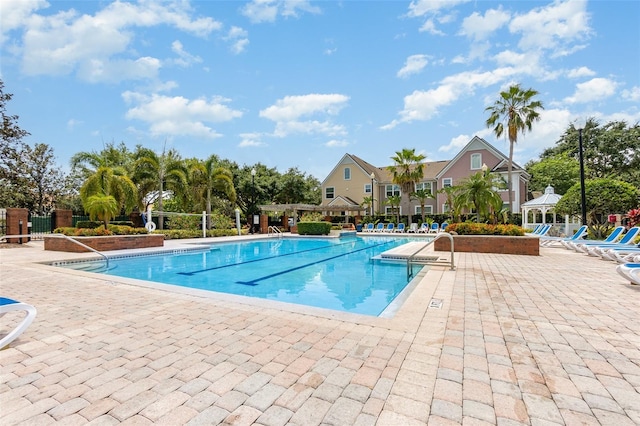 6611 Time Square Ave Unit 103, Orlando, FL 32835 - community pool featuring a patio area and a gazebo