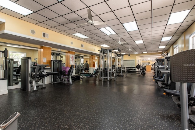 6611 Time Square Ave Unit 103, Orlando, FL 32835 - exercise room with a drop ceiling and healthy amount of natural light