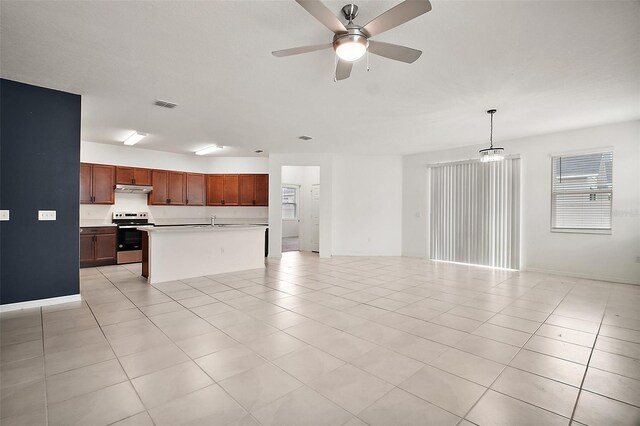 7054 Cruz Ct, Lakeland, FL 33813 - unfurnished living room with a sink, a ceiling fan, and light tile patterned floors