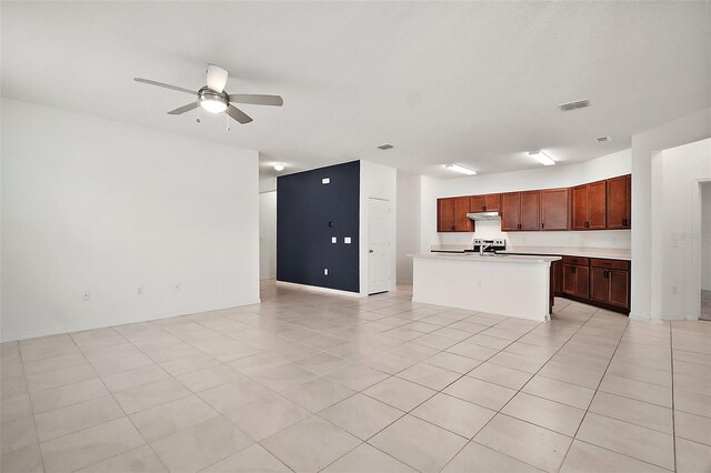 7054 Cruz Ct, Lakeland, FL 33813 - unfurnished living room featuring a ceiling fan and light tile patterned flooring