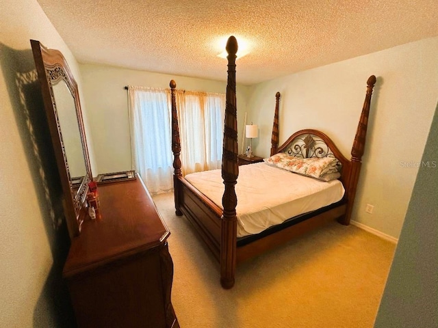 211 Hunt St, Clermont, FL 34711 - carpeted bedroom featuring a textured ceiling