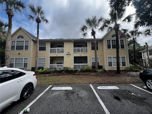 1089 S Hiawassee Rd Unit 323, Orlando, FL 32835 - view of property with uncovered parking