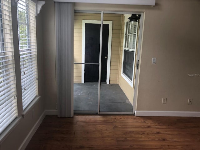 1089 S Hiawassee Rd Unit 323, Orlando, FL 32835 - unfurnished room with baseboards and wood finished floors