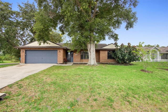 1106 Alpine Ave NW, Palm Bay, FL 32907 - single story home featuring an attached garage, concrete driveway, brick siding, and a front lawn