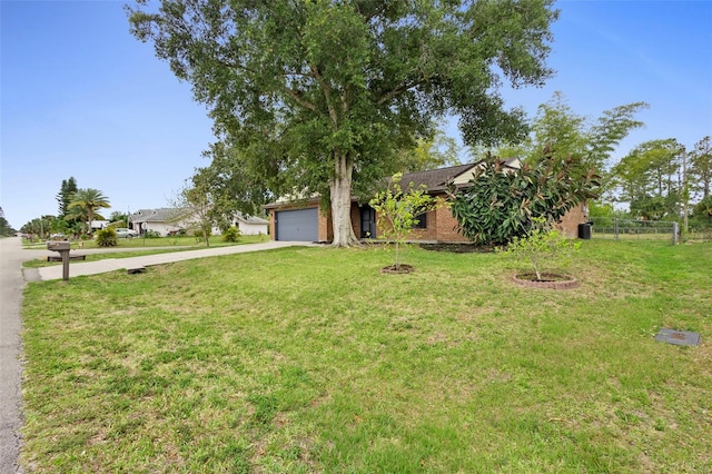 1106 Alpine Ave NW, Palm Bay, FL 32907 - obstructed view of property with concrete driveway and a garage