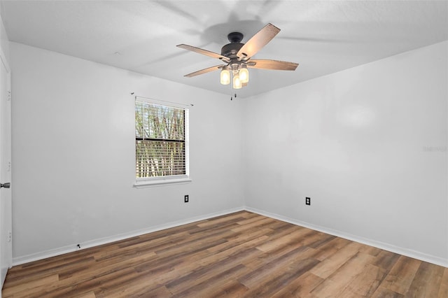 1106 Alpine Ave NW, Palm Bay, FL 32907 - empty room with wood finished floors, ceiling fan, and baseboards