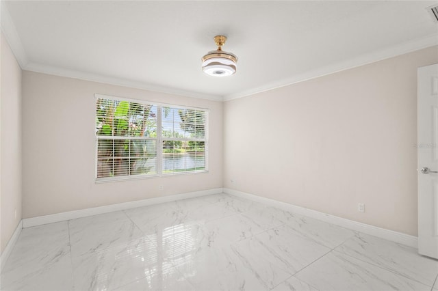 11863 Delfina Ln, Orlando, FL 32827 - unfurnished room featuring marble finish flooring, crown molding, and baseboards