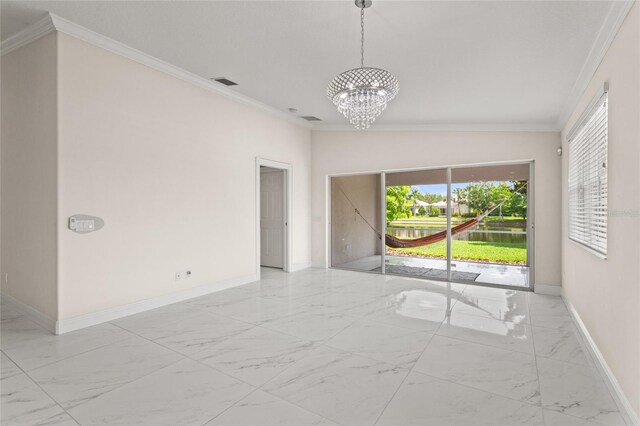 11863 Delfina Ln, Orlando, FL 32827 - spare room featuring marble finish floors, baseboards, crown molding, and a chandelier