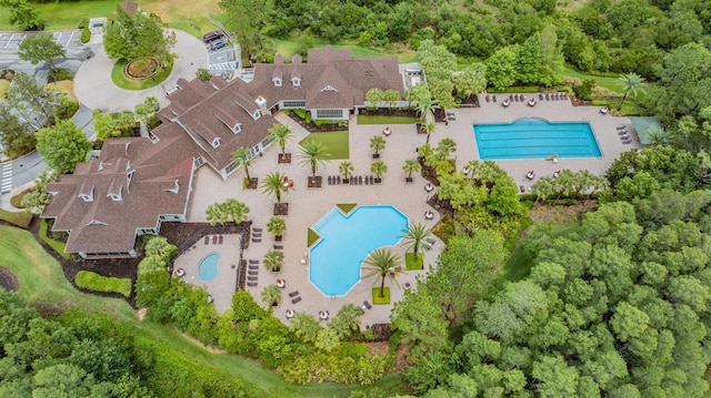 8721 Crystal Creek Ct, Land O Lakes, FL 34638 - aerial overview of property's location featuring a pool area