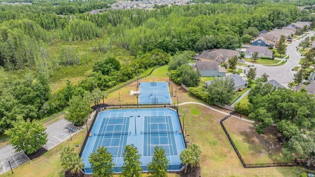 8721 Crystal Creek Ct, Land O Lakes, FL 34638 - aerial perspective of suburban area featuring a heavily wooded area