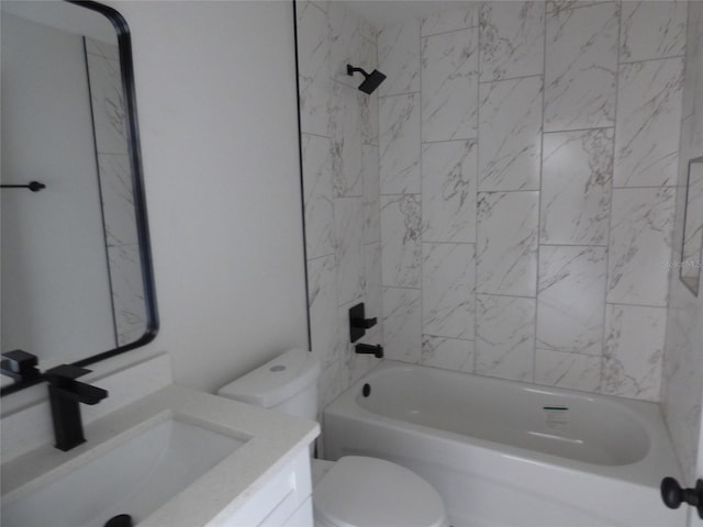 bathroom with vanity, toilet, and washtub / shower combination