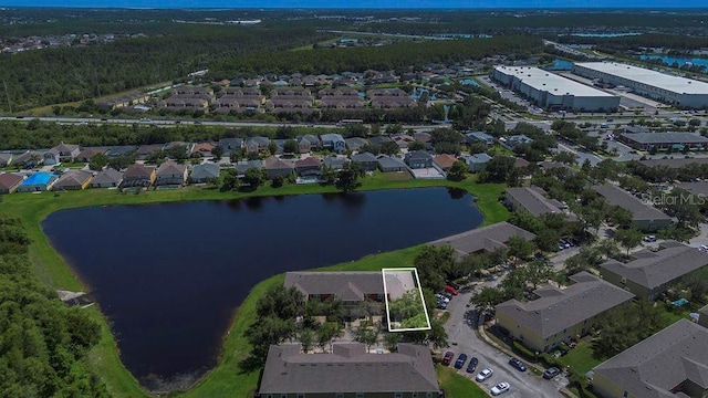 13480 Applerose Ln Unit 19, Orlando, FL 32824 - aerial view of residential area featuring a nearby body of water and property parcel outlined