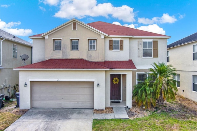 1744 Pine Ridge Dr, Davenport, FL 33896 - view of front facade with stucco siding, driveway, an attached garage, and a shingled roof