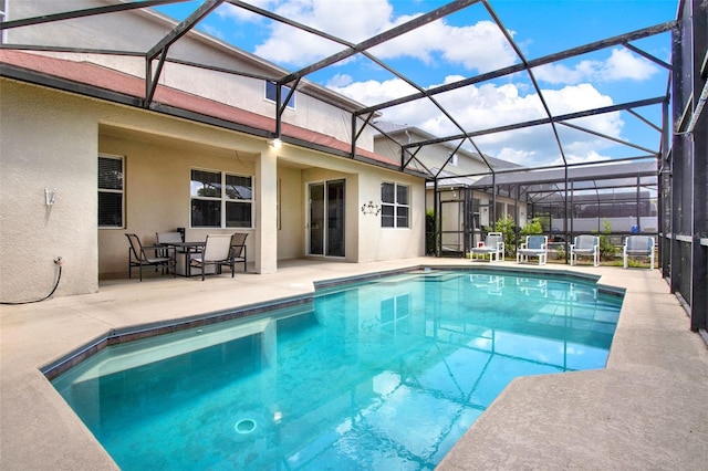 1744 Pine Ridge Dr, Davenport, FL 33896 - swimming pool with a patio and glass enclosure