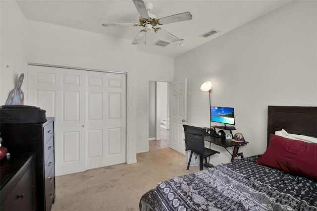 1744 Pine Ridge Dr, Davenport, FL 33896 - bedroom featuring light colored carpet, a closet, and a ceiling fan