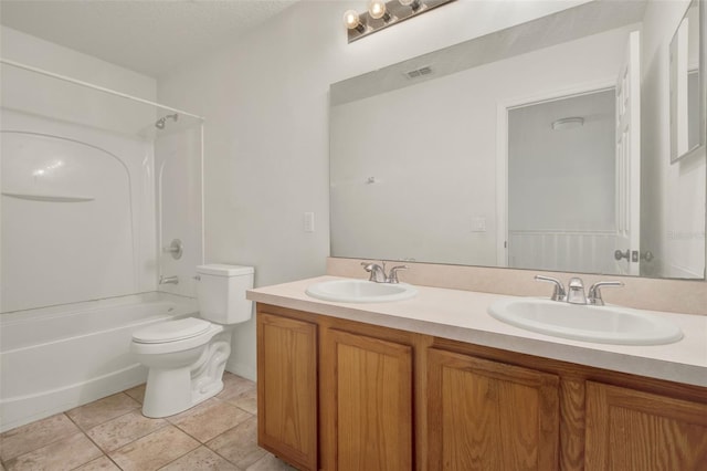 1744 Pine Ridge Dr, Davenport, FL 33896 - full bathroom with toilet, double vanity, and bathtub / shower combination