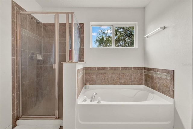 1744 Pine Ridge Dr, Davenport, FL 33896 - bathroom featuring a bath and a shower stall