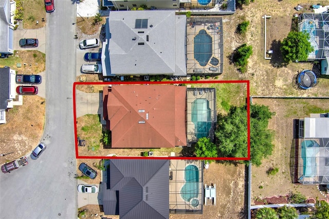1744 Pine Ridge Dr, Davenport, FL 33896 - aerial view of property and surrounding area featuring property boundaries highlighted