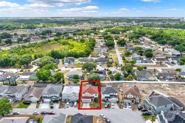 1744 Pine Ridge Dr, Davenport, FL 33896 - aerial perspective of suburban area featuring property parcel outlined