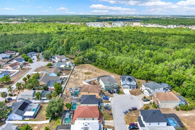 1744 Pine Ridge Dr, Davenport, FL 33896 - aerial view of residential area with a heavily wooded area