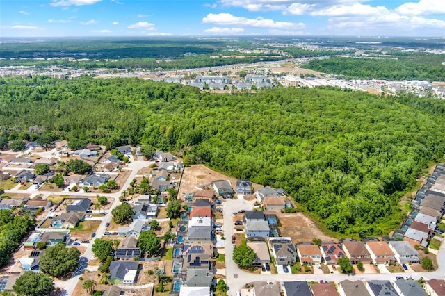 1744 Pine Ridge Dr, Davenport, FL 33896 - aerial view of property's location featuring a forest and nearby suburban area