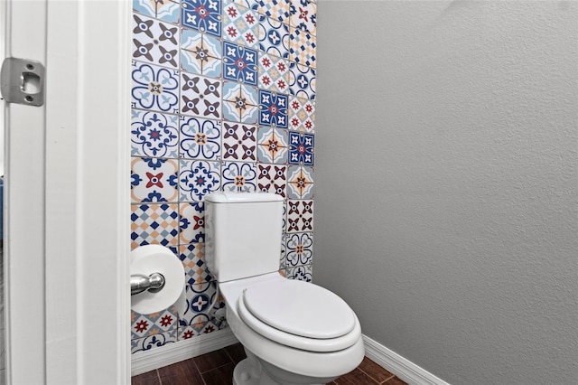 308 Michael Blake Blvd, Winter Springs, FL 32708 - bathroom featuring baseboards, wood finished floors, and toilet