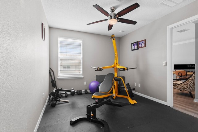 308 Michael Blake Blvd, Winter Springs, FL 32708 - exercise area featuring a ceiling fan, baseboards, and a textured ceiling