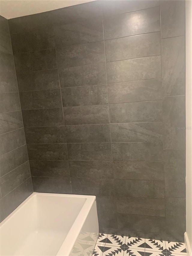 701 Twin Lake Ave, Deltona, FL 32738 - full bathroom featuring a shower and a tub