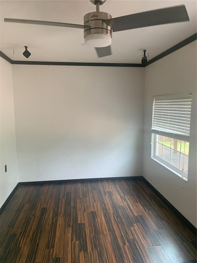 701 Twin Lake Ave, Deltona, FL 32738 - empty room with ornamental molding and dark wood-type flooring