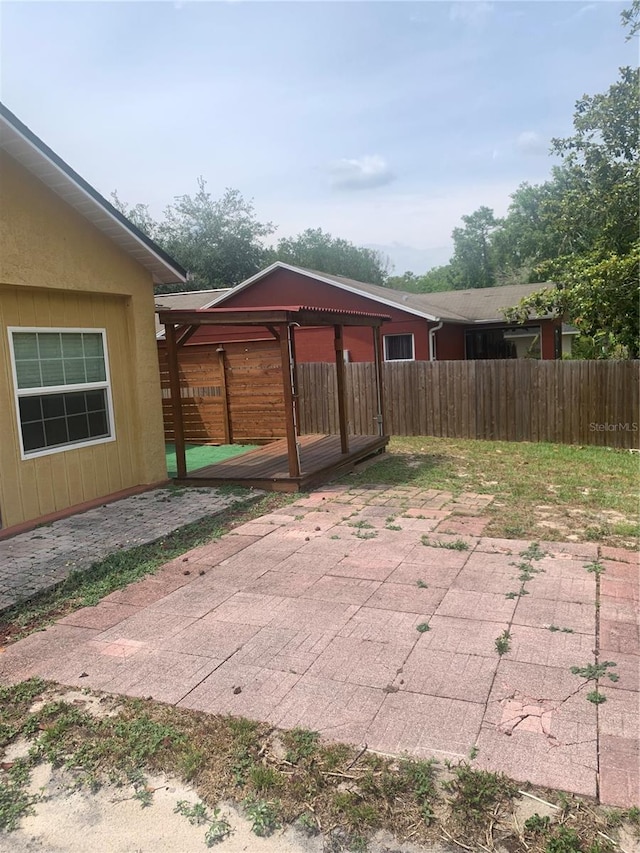 701 Twin Lake Ave, Deltona, FL 32738 - view of patio / terrace featuring fence and a wooden deck
