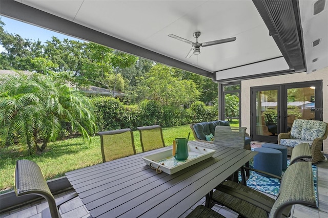711 Valencia Ct, Winter Garden, FL 34787 - wooden terrace with a ceiling fan, a yard, view of scattered trees, and outdoor dining space