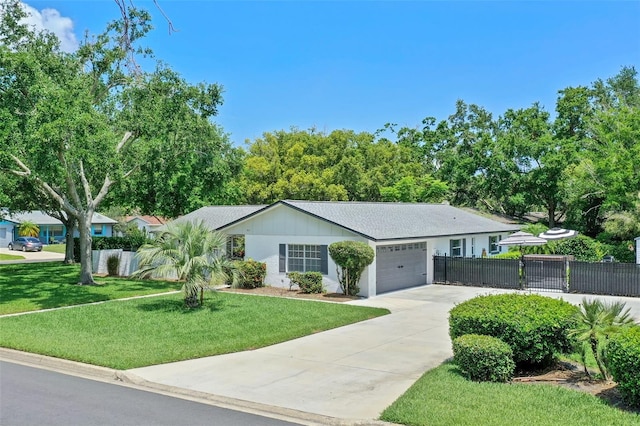711 Valencia Ct, Winter Garden, FL 34787 - ranch-style home featuring concrete driveway and an attached garage