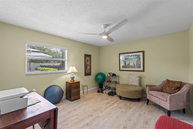 711 Valencia Ct, Winter Garden, FL 34787 - office space featuring wood finished floors, a ceiling fan, a textured ceiling, and baseboards
