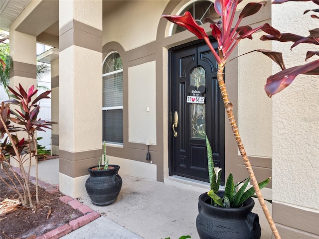 1319 Castleport Rd, Winter Garden, FL 34787 - property entrance with stucco siding