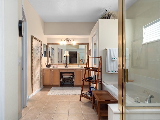 1319 Castleport Rd, Winter Garden, FL 34787 - full bathroom with a whirlpool tub, vanity, tile patterned flooring, and baseboards