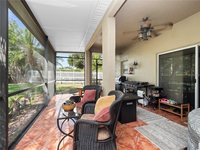 1319 Castleport Rd, Winter Garden, FL 34787 - sunroom / solarium featuring expansive windows, a ceiling fan, and tile patterned flooring