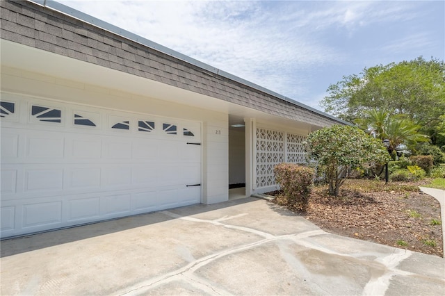 garage featuring driveway
