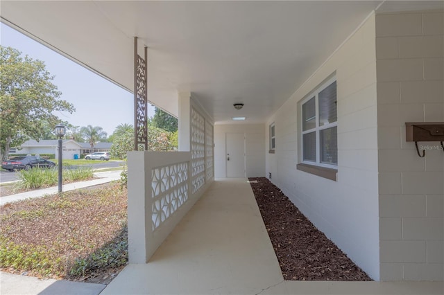 view of patio featuring a porch