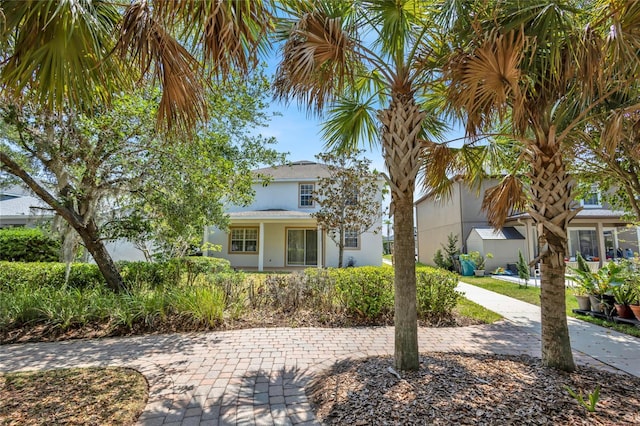view of front of house featuring stucco siding
