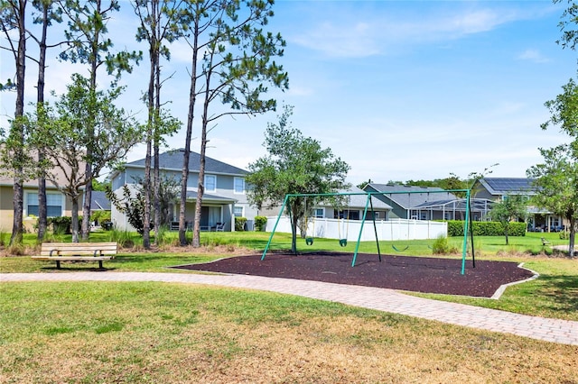 community play area with a lawn
