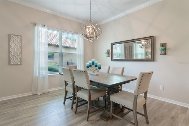 595 American Holly Pl, Oviedo, FL 32765 - dining space with a chandelier, light wood finished floors, crown molding, and baseboards