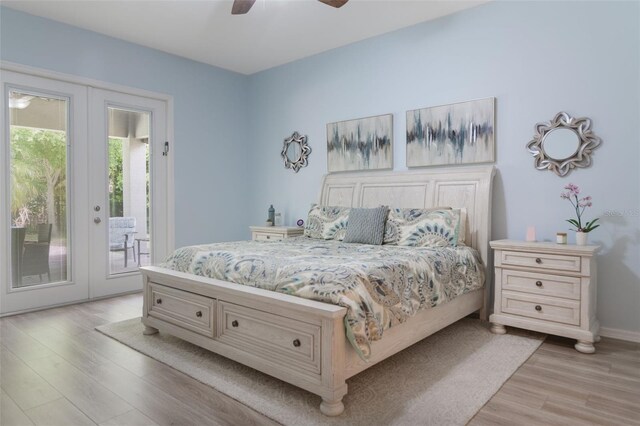 595 American Holly Pl, Oviedo, FL 32765 - bedroom featuring french doors, access to outside, light wood-type flooring, and ceiling fan