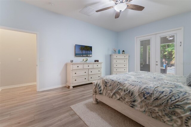 595 American Holly Pl, Oviedo, FL 32765 - bedroom featuring access to exterior, french doors, light wood-style floors, baseboards, and ceiling fan