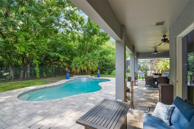 595 American Holly Pl, Oviedo, FL 32765 - view of pool with a ceiling fan, a patio area, outdoor dining area, fence, and view of wooded area