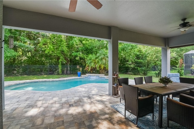 595 American Holly Pl, Oviedo, FL 32765 - view of pool featuring a ceiling fan, a fenced backyard, a patio area, and outdoor dining space