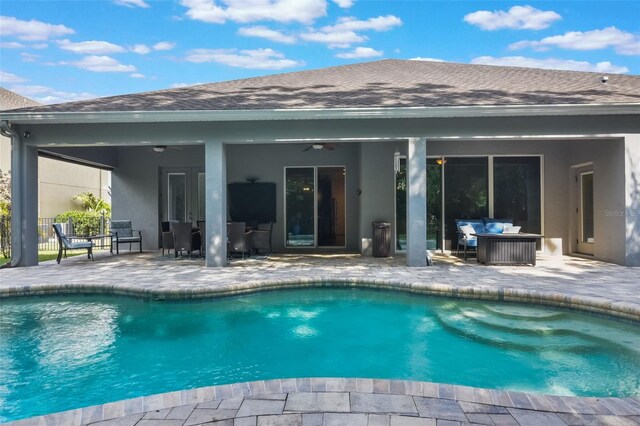 595 American Holly Pl, Oviedo, FL 32765 - swimming pool featuring ceiling fan, an outdoor hangout area, and a patio