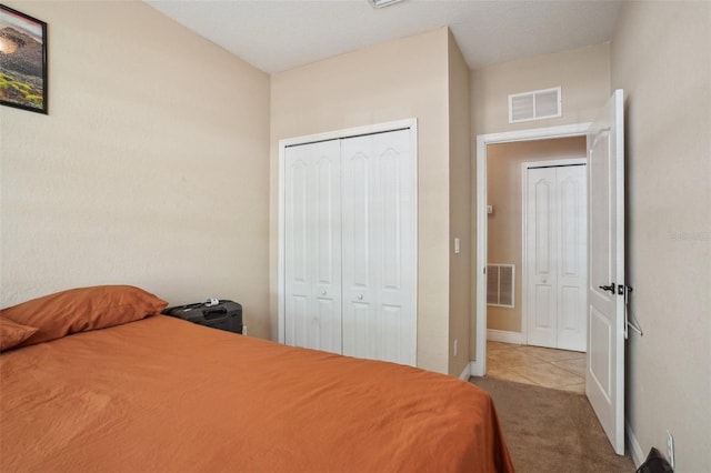 3721 S Lake Orlando Pkwy Unit 05, Orlando, FL 32808 - bedroom featuring carpet floors and a closet