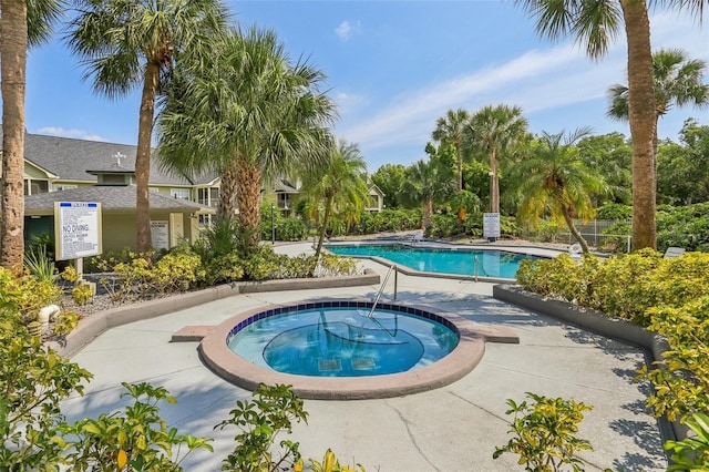 3721 S Lake Orlando Pkwy Unit 05, Orlando, FL 32808 - community pool with a community hot tub