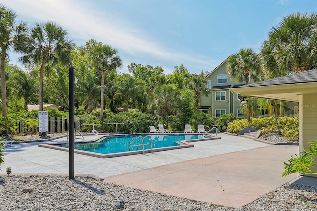 3721 S Lake Orlando Pkwy Unit 05, Orlando, FL 32808 - community pool with a patio and fence